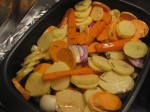 cut up different veggies (here i used potatoes, sweet potatoes, carrots, onions and garlic), throw them in an oven proof dish, drizzle with olive oil, sea salt, pepper, chilies and rosmary