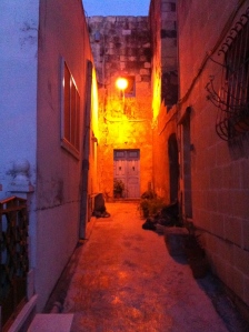 tiny little alley on a walk through a village